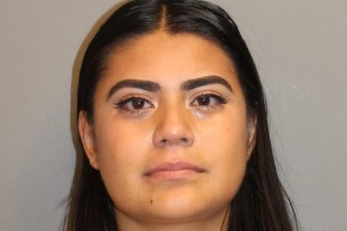 Norwalk woman arrested after allegedly driving into police officer, pedestrian